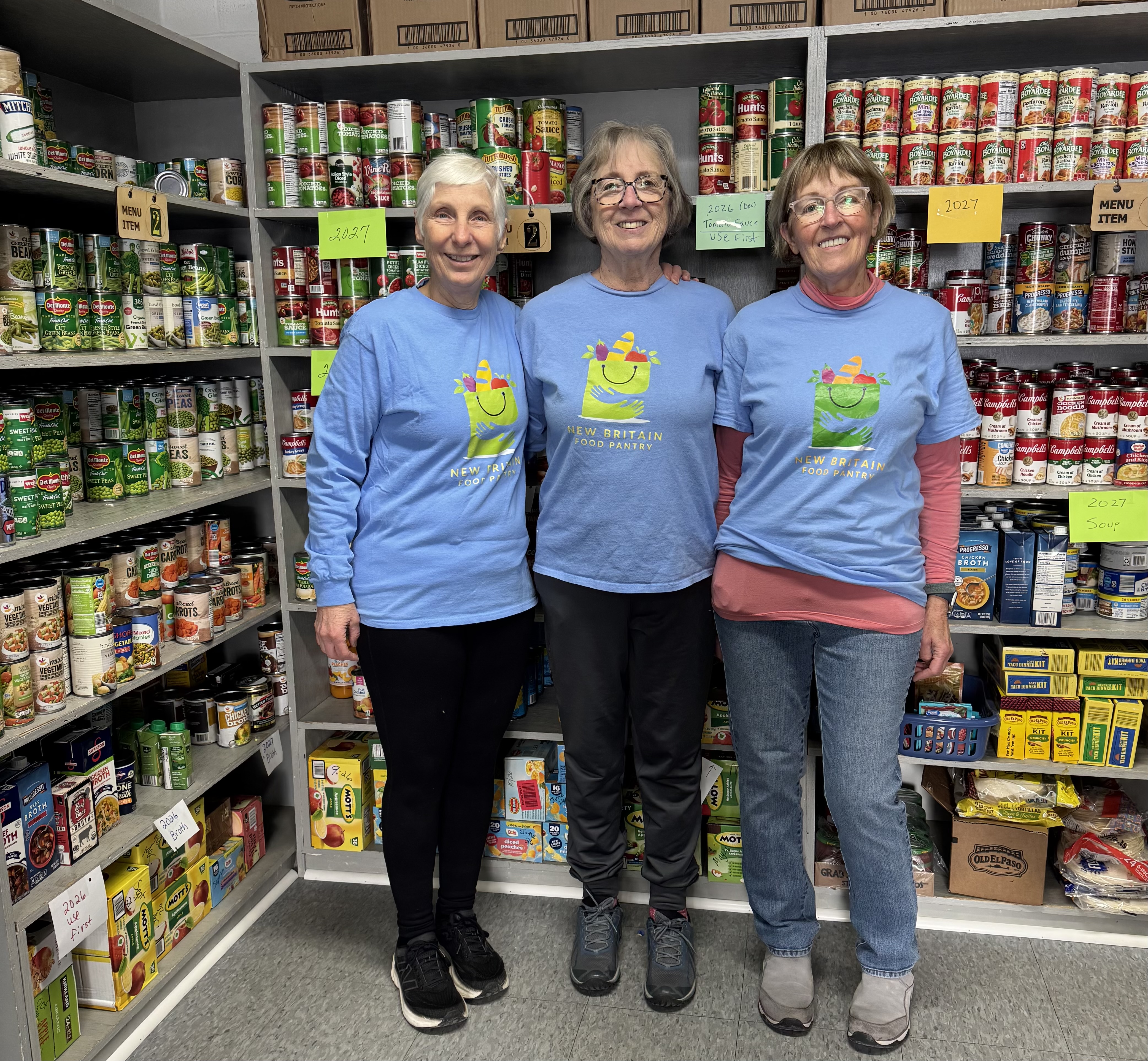 Members of the New Britain Food Pantry leadership team in the pantry